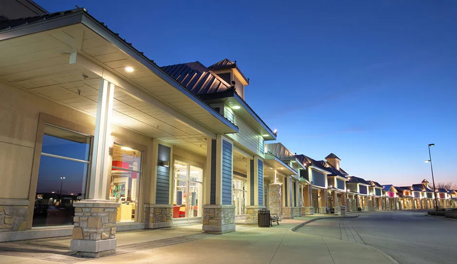 Strip mall at night time.