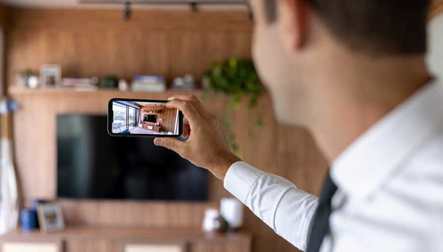 Man holding phone.